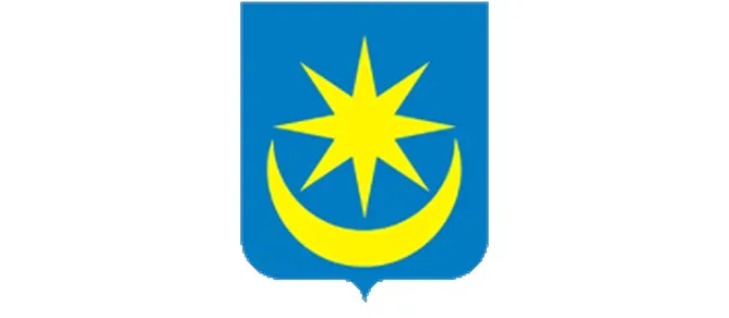 Kliknięcie spowoduje wyświetlenie powiększenia Niebieska tarcza herbu z ośmioramienną złotą gwiazdą ponad złotym półksiężycem.