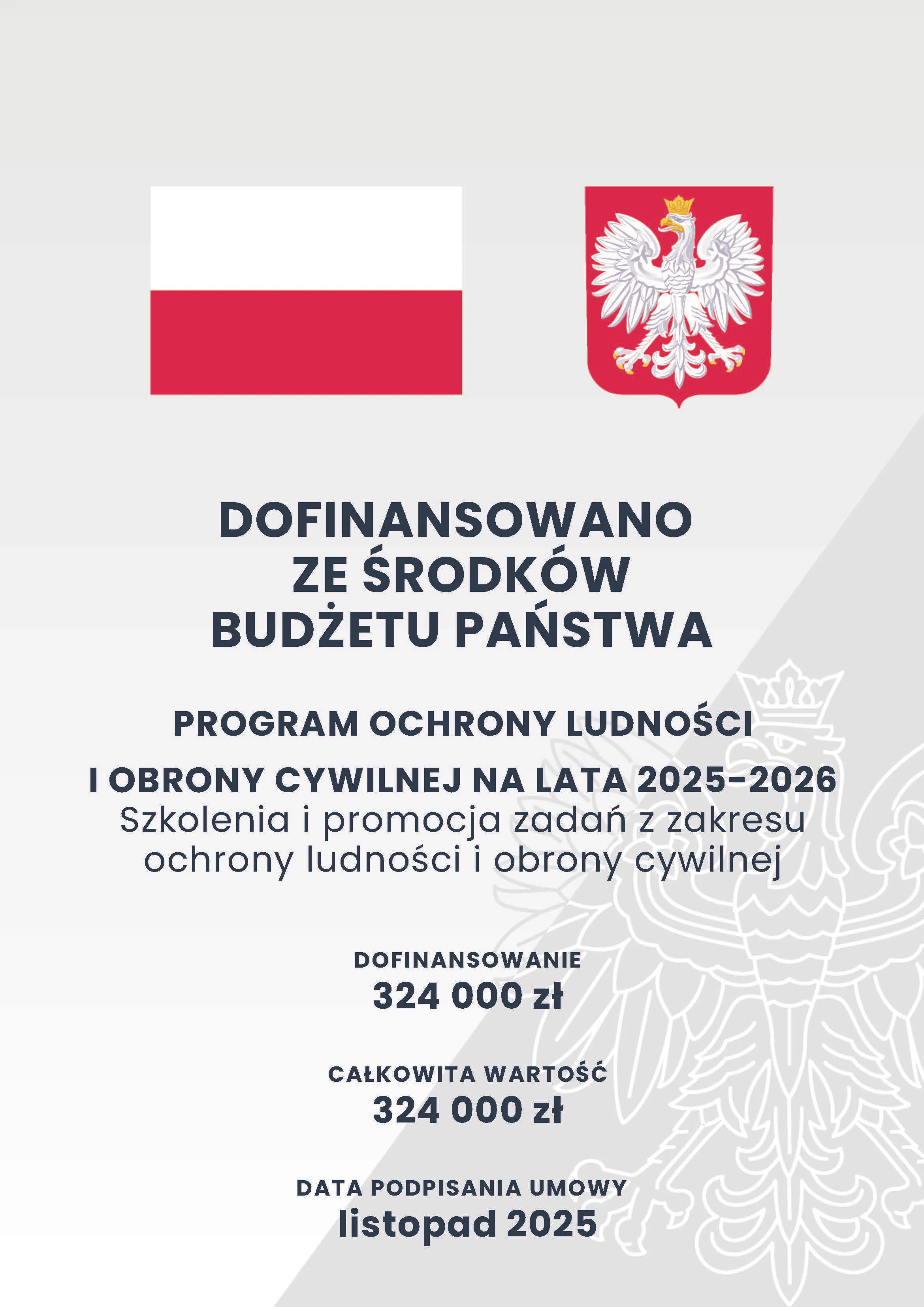 Kliknięcie powiększy obraz. Flaga Polski i godło Polski na jasnoszarym tle. Tekst informuje o dofinansowaniu ze środków budżetu państwa na program ochrony ludności i obrony cywilnej na lata 2025-2026. Kwota dofinansowania i całkowita wartość wynoszą po 324 000 zł. Data podpisania umowy to listopad 2025. W tle wytłoczony biały orzeł państwowy.