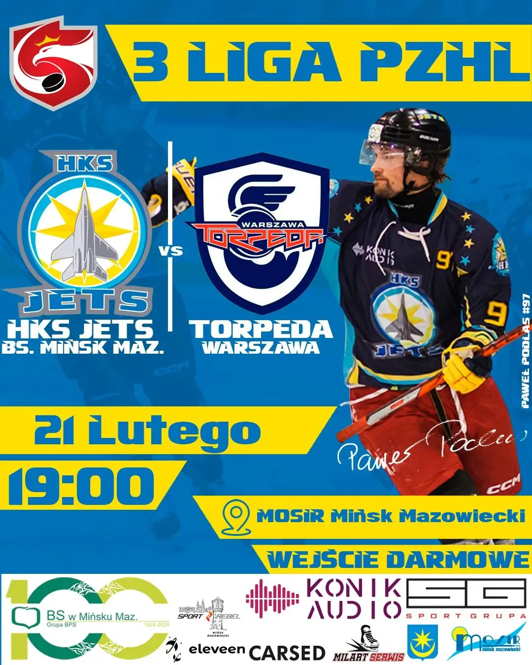 Kliknięcie powiększy obraz. NIiebieskie tło z żółtymi akcentami. Po lewej dwa logotypy drużyn, pośrodku pionowa kreska z literami „vs”. Po prawej stoi zawodnik w granatowo-żółtym stroju z kijem i czerwonymi spodenkami. U dołu pasek informacyjny z datą, godziną i miejscem oraz zapowiedzią bezpłatnego wstępu. Na górze napis informujący o lidze.