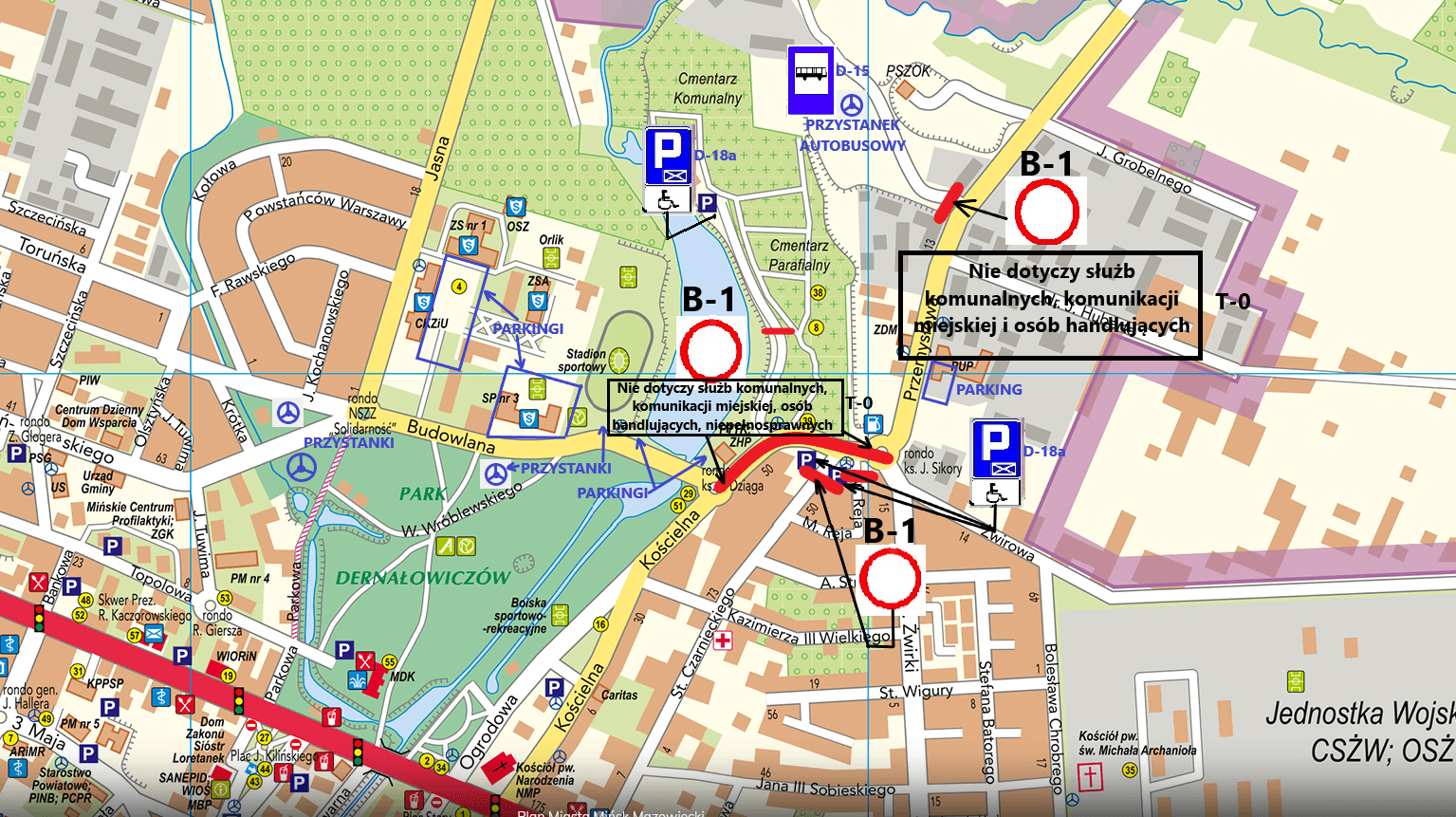 Kliknięcie powiększy obraz. Kolorowa mapa miasta z oznaczonym parkiem pośrodku i zielonym terenem Domałowiczów. Ulice i ronda są widoczne w sieci ulic, główna droga przebiega na osi poziomej. Trzy czerwone okręgi z etykietą B-1 wskazują miejsca na północny wschód, w centrum i na południe. Ikony parkingów, przystanków autobusowych i obiektów użyteczności publicznej rozmieszczone są wokół parku. Jasnoróżowa strefa otacza obszar przemysłowy po prawej stronie mapy. Several small red barriers mark temporary road closures near the central junction.