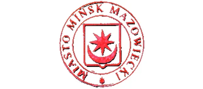 Kliknięcie spowoduje wyświetlenie powiększenia Czerwony okrągły herb z ośmioramienną gwiazdą i półksiężycem w środku oraz napisem „Miasto Mińsk Mazowiecki” wokoło.